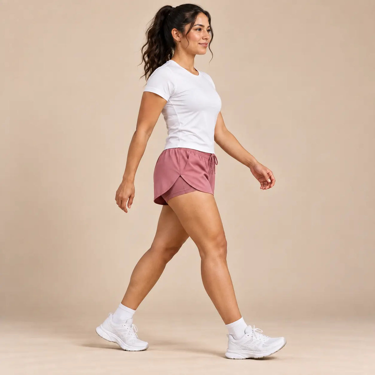 Pantaloneta running rosa vista lateral